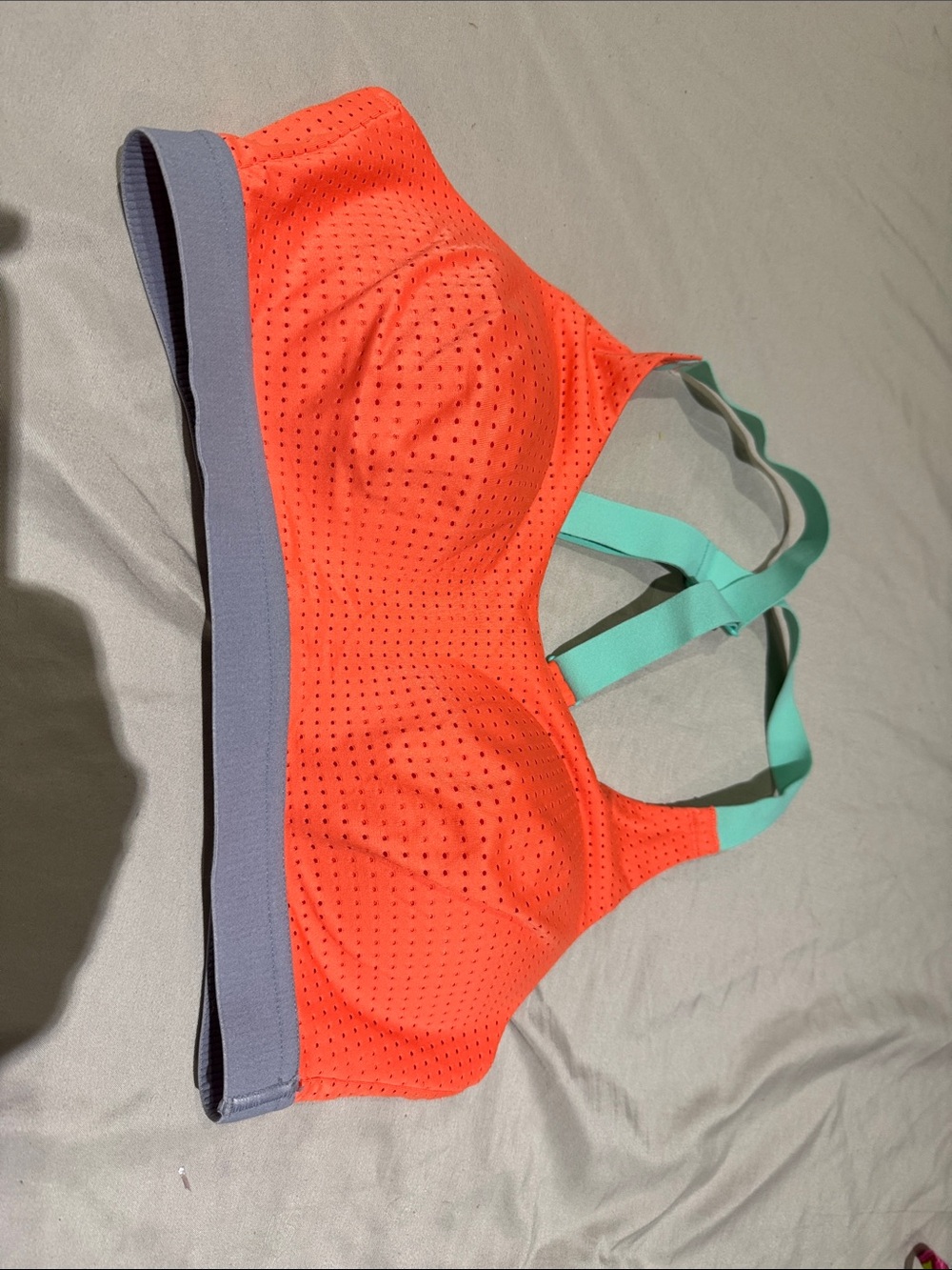 Coral Perforated Sports Bra with Mint Straps and Gray Band